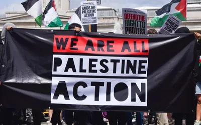 Protest banner saying "We are all Palestine Action"